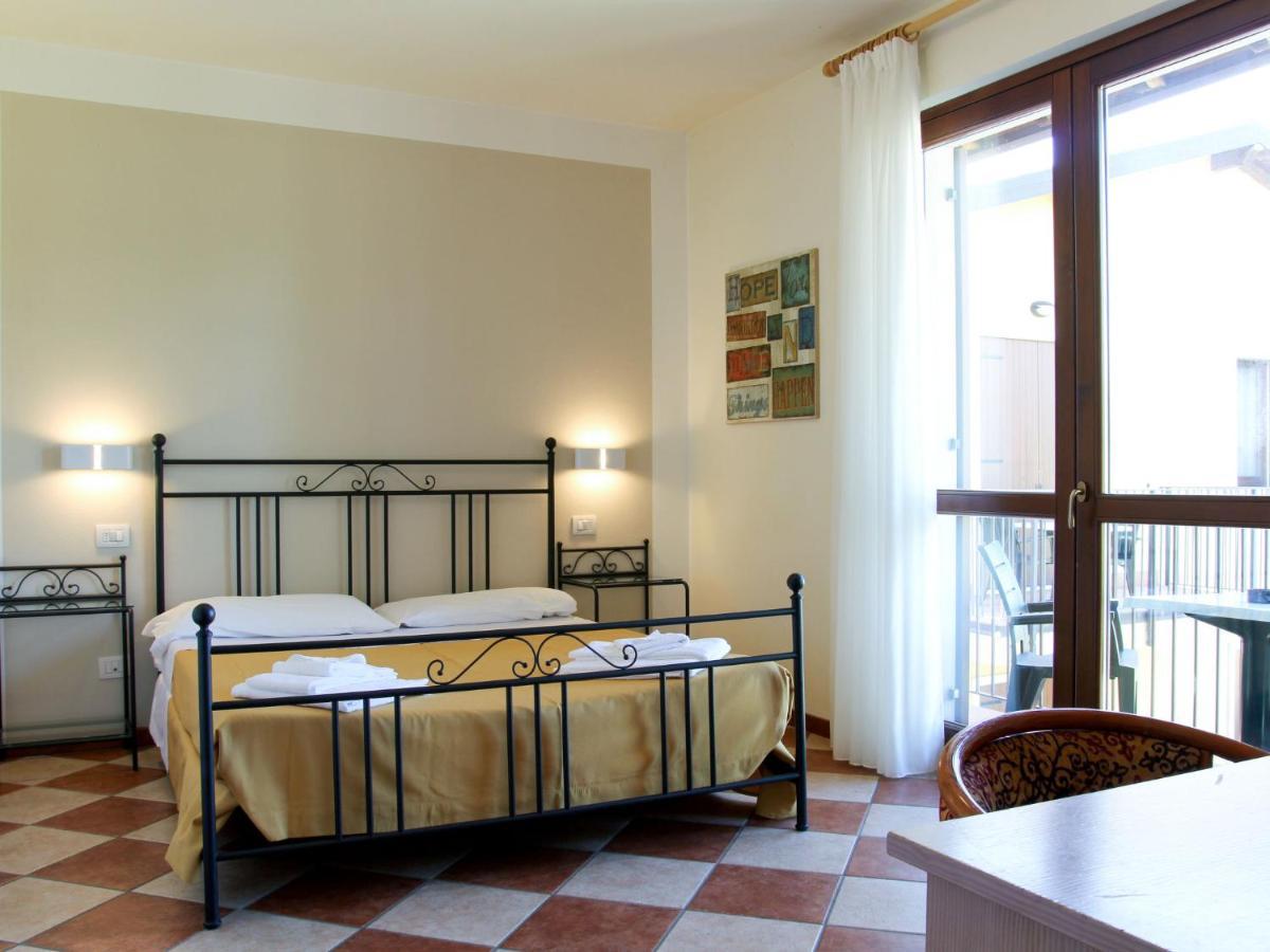 Apartment Eden By Interhome Cavalcaselle Bagian luar foto